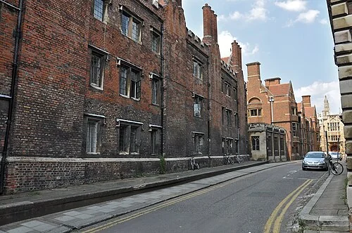 Historic college buildings lining Queens’ Lane in central Cambridge