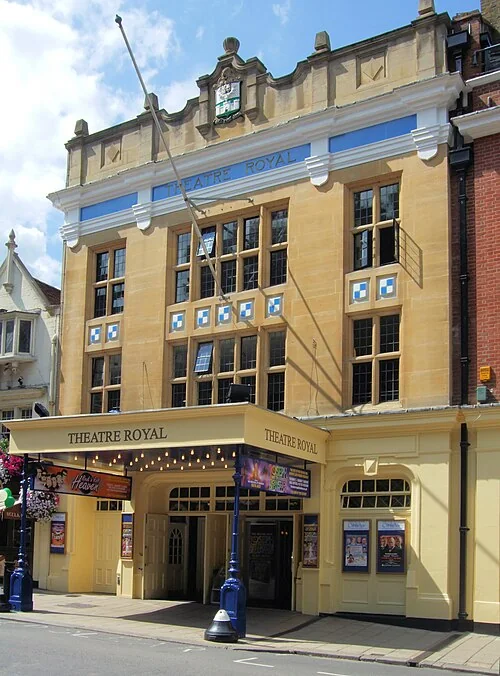 Exterior of Theatre Royal Windsor on Thames Street, with its curved corner façade