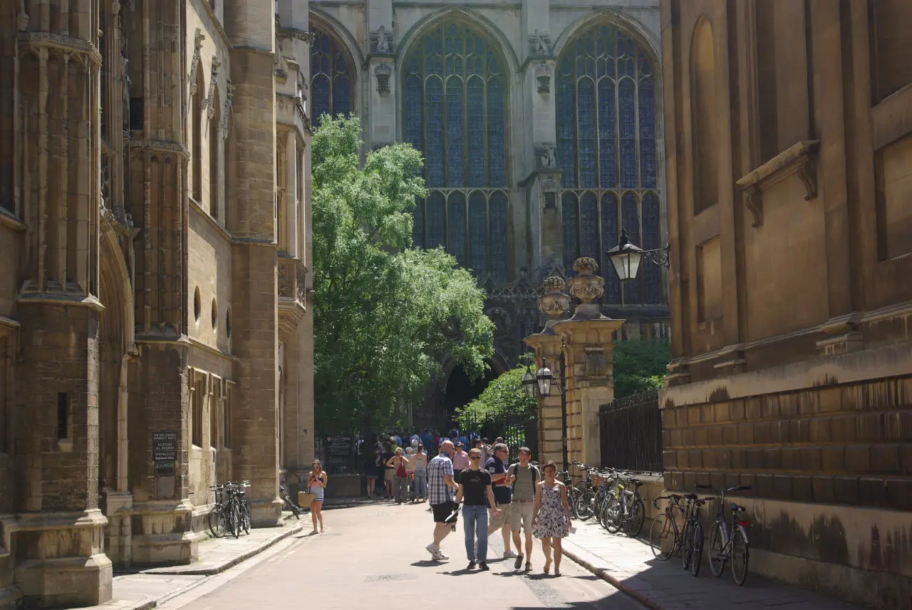 Trinity Lane running between the stone college buildings in Cambridge